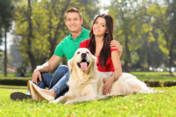 couple and dog