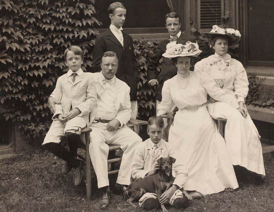 Teddy Roosevelt family portrait with Manchester Terrier